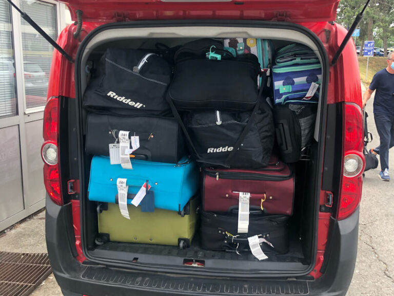 trunk of the car with suitcases